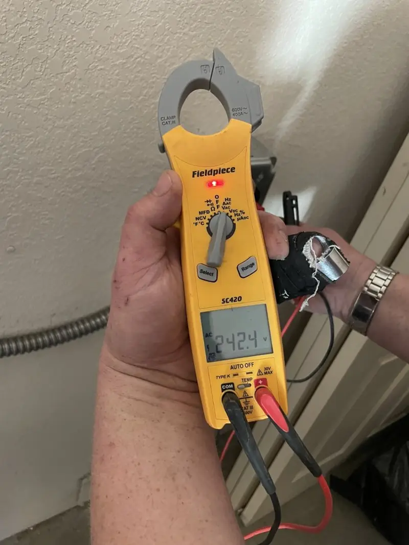 Voltage testing with clamp meter during Circuit Breaker Repair in Cherry Grove